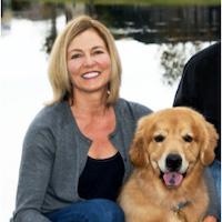 Amy Flom with golden retriever