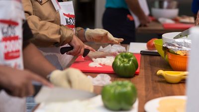 Kids chopping vegetables