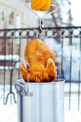 Turkey coming out of the fryer