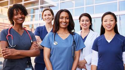 Doctors and nurses smiling