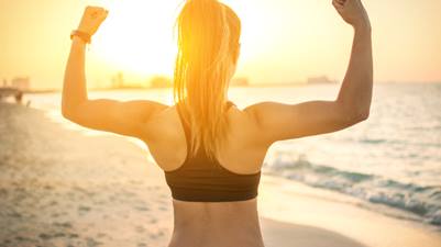 Image of a woman flexing her arms