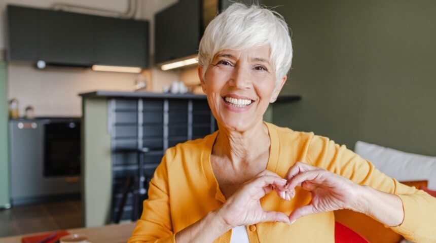 Lady doing heart sign