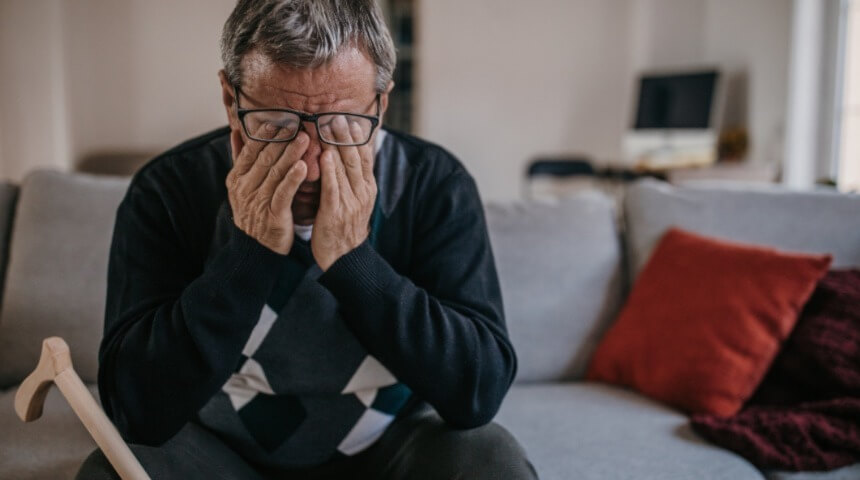 Person rubbing his eyes