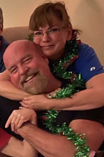  Wife hugging McCarty