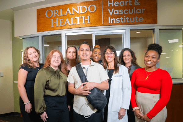 Man standing in front of his doctors