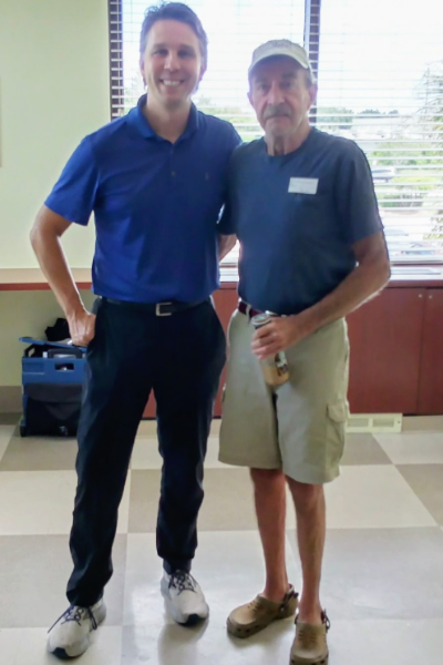 Doctor next to older man