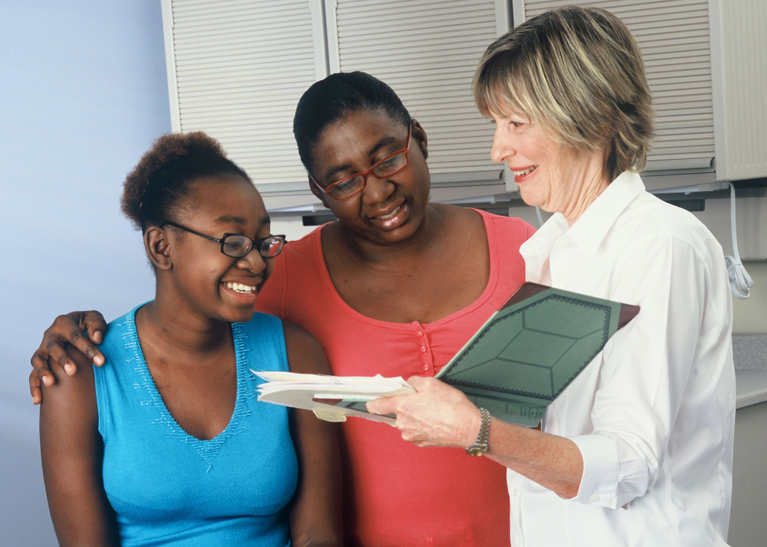 Patient and family talking to a physician.