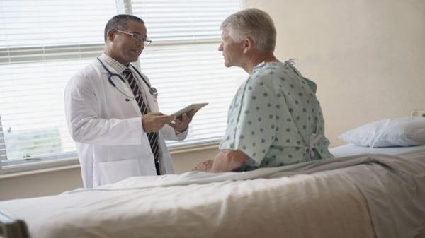 Doctor talking to patient.