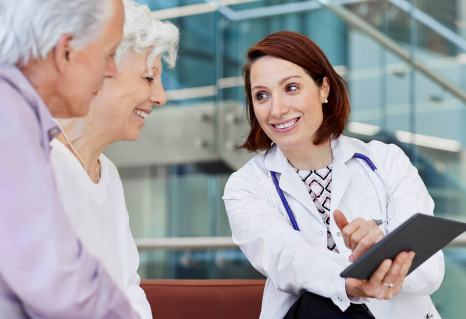 doctor showing patients tablet