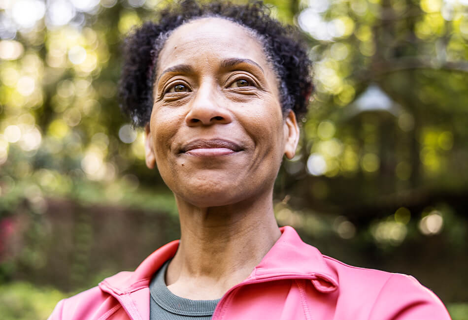 woman smiling outdoors