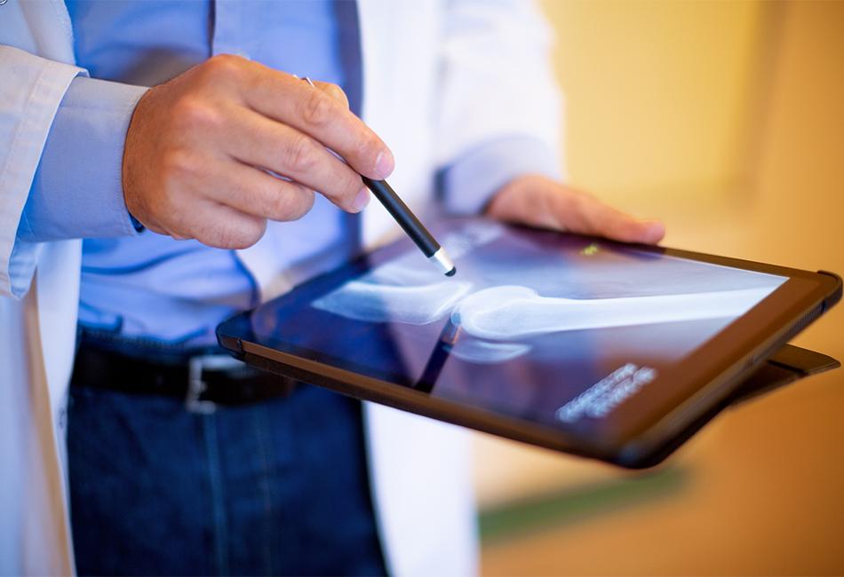 doctor using a tablet