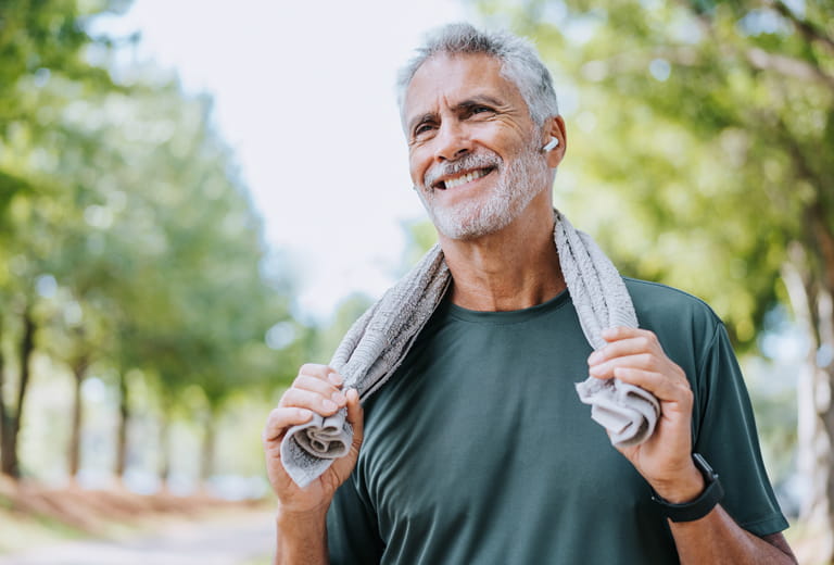 man with towel on his neck
