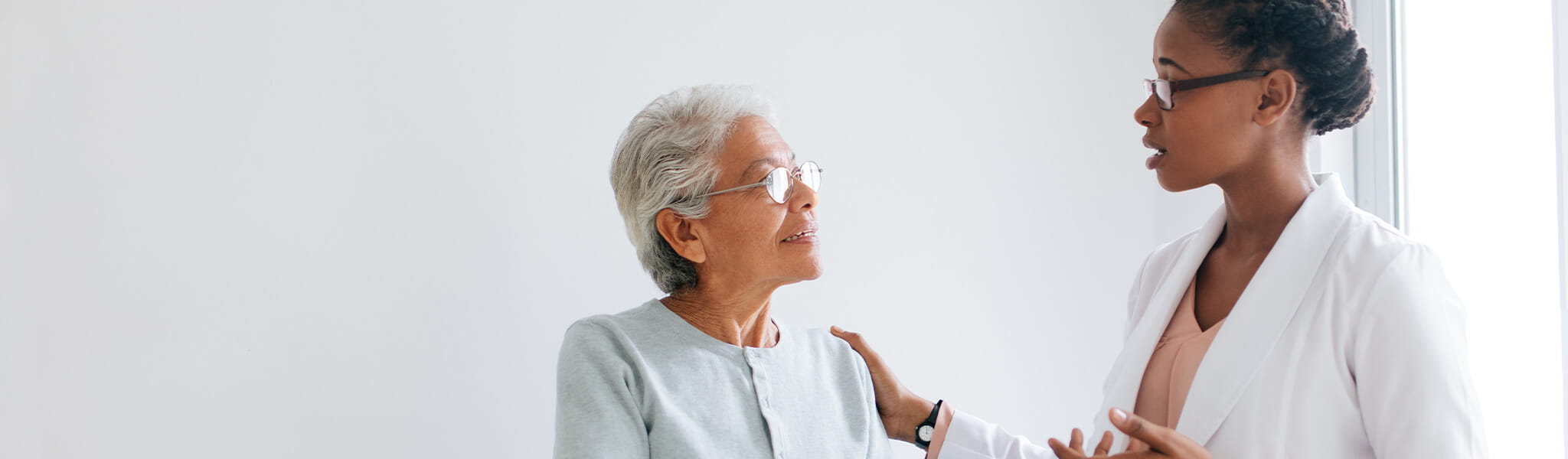 doctor speaking with patient