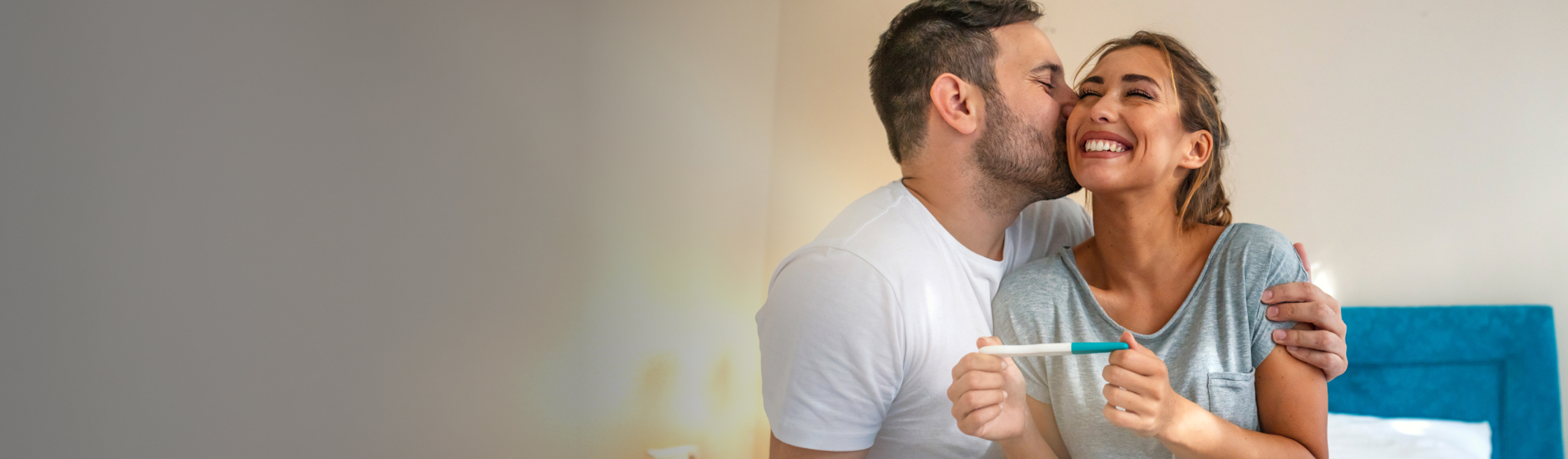 Husband and wife with pregnancy test