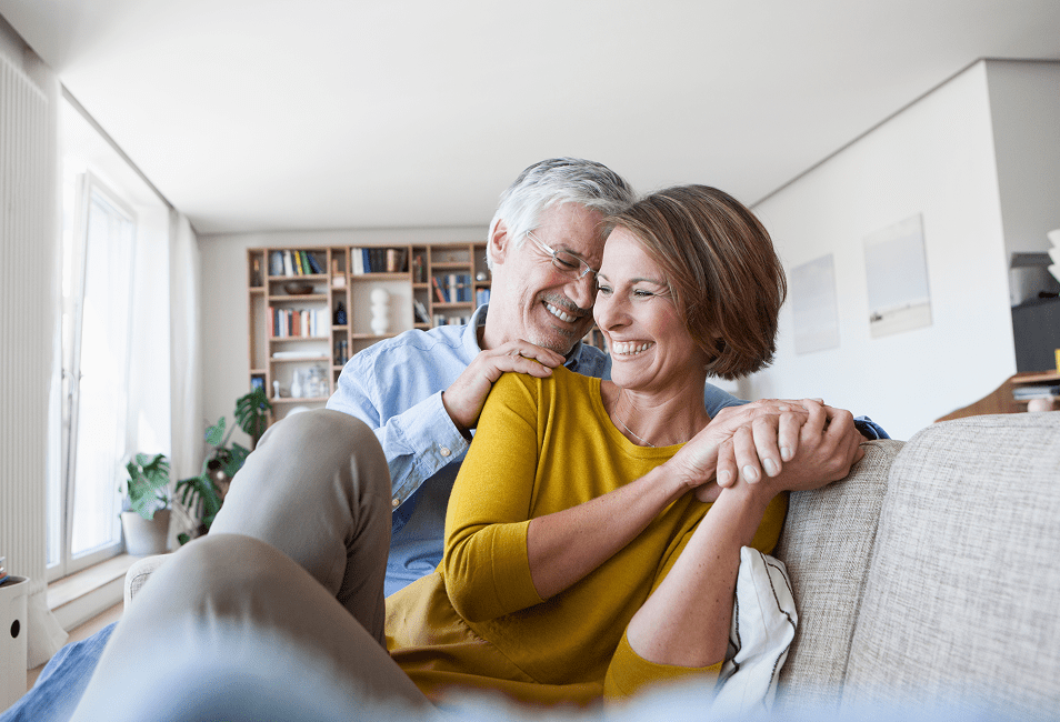 Husband and Wife smiling