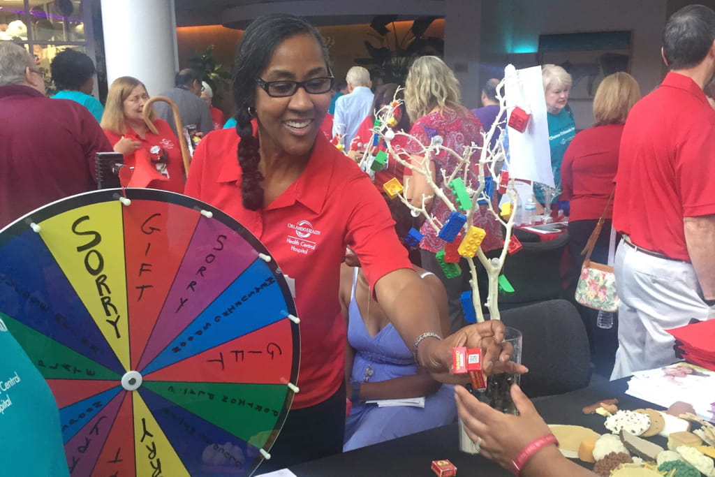 Team member with spinning wheel