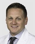 Caleb King, MD