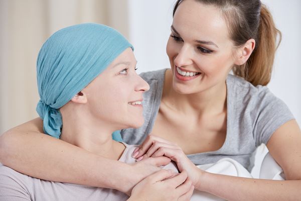 hopeful-cancer-woman-with-friend-PHGLJAG