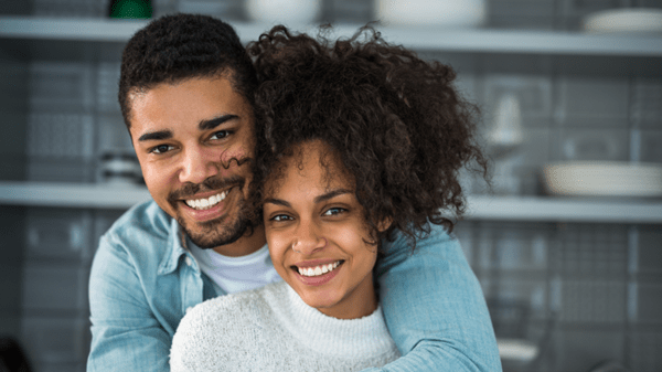 Man and woman embracing