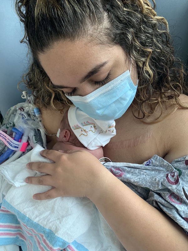 Jomary holding Diana