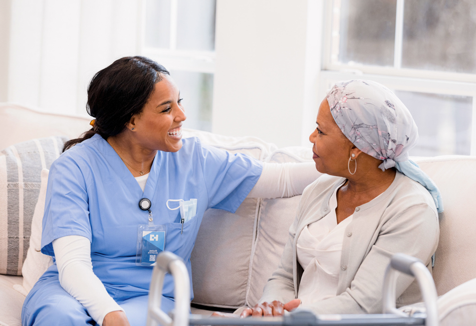 nurse sitting with patient