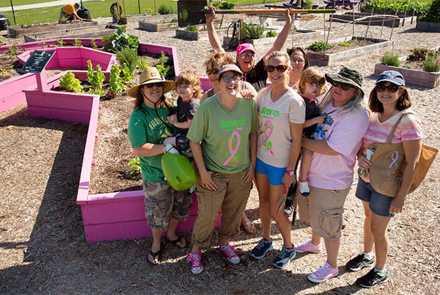 Orlando Health team members working in a garden