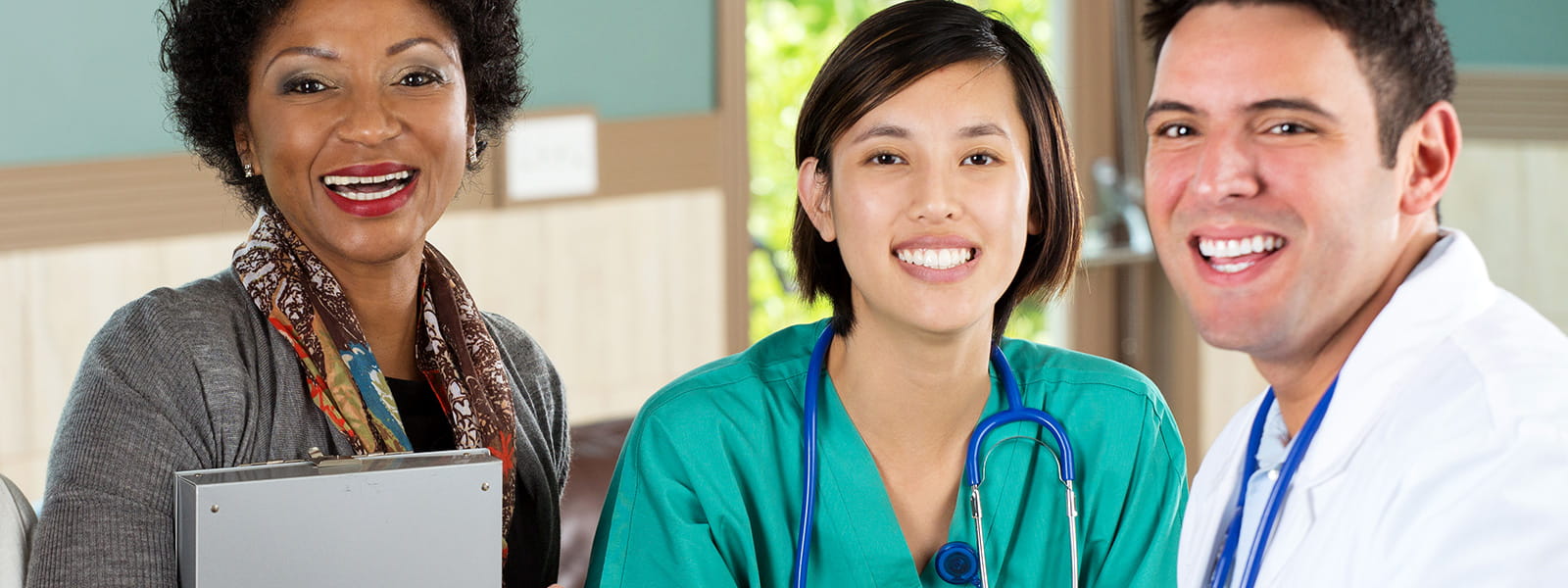 Medical practice staff smiling