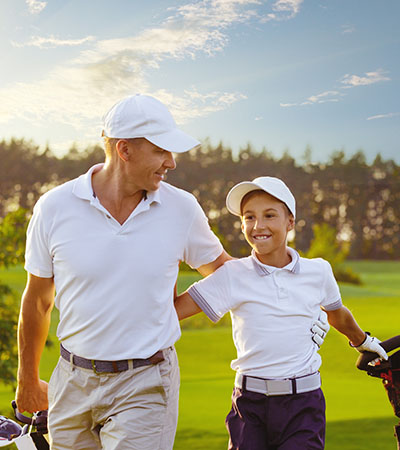 Father and son golfing