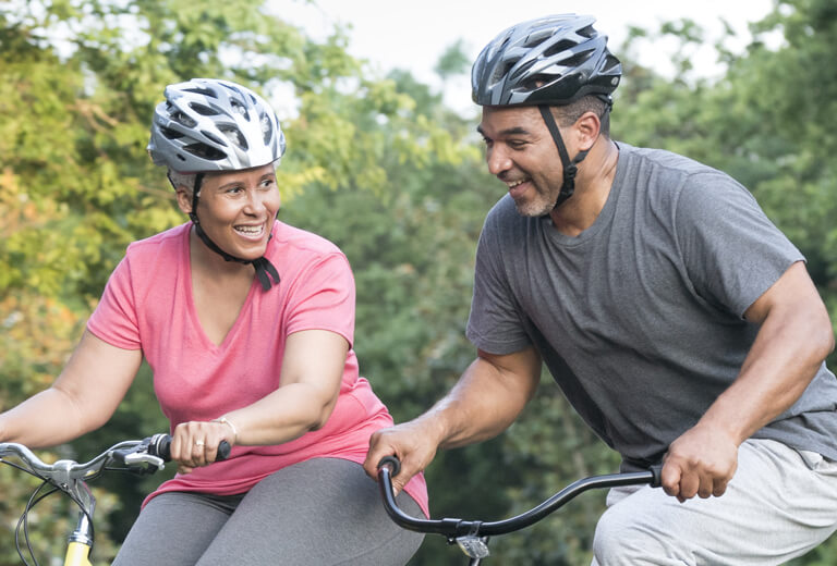 Two people cycling