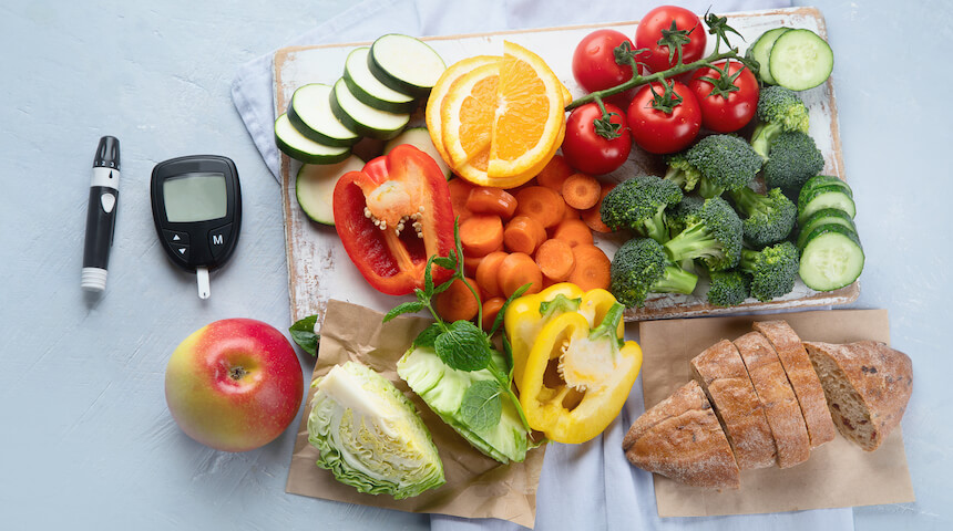 Vegetables, fruit, bread and blood sugar monitor test kit
