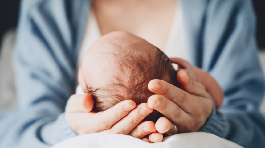 Mom holding newborn