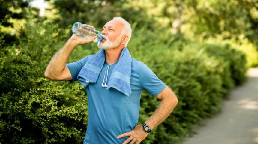 Runner drinking water