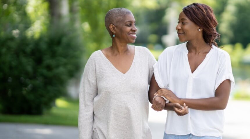 2 friends walking and holding hands