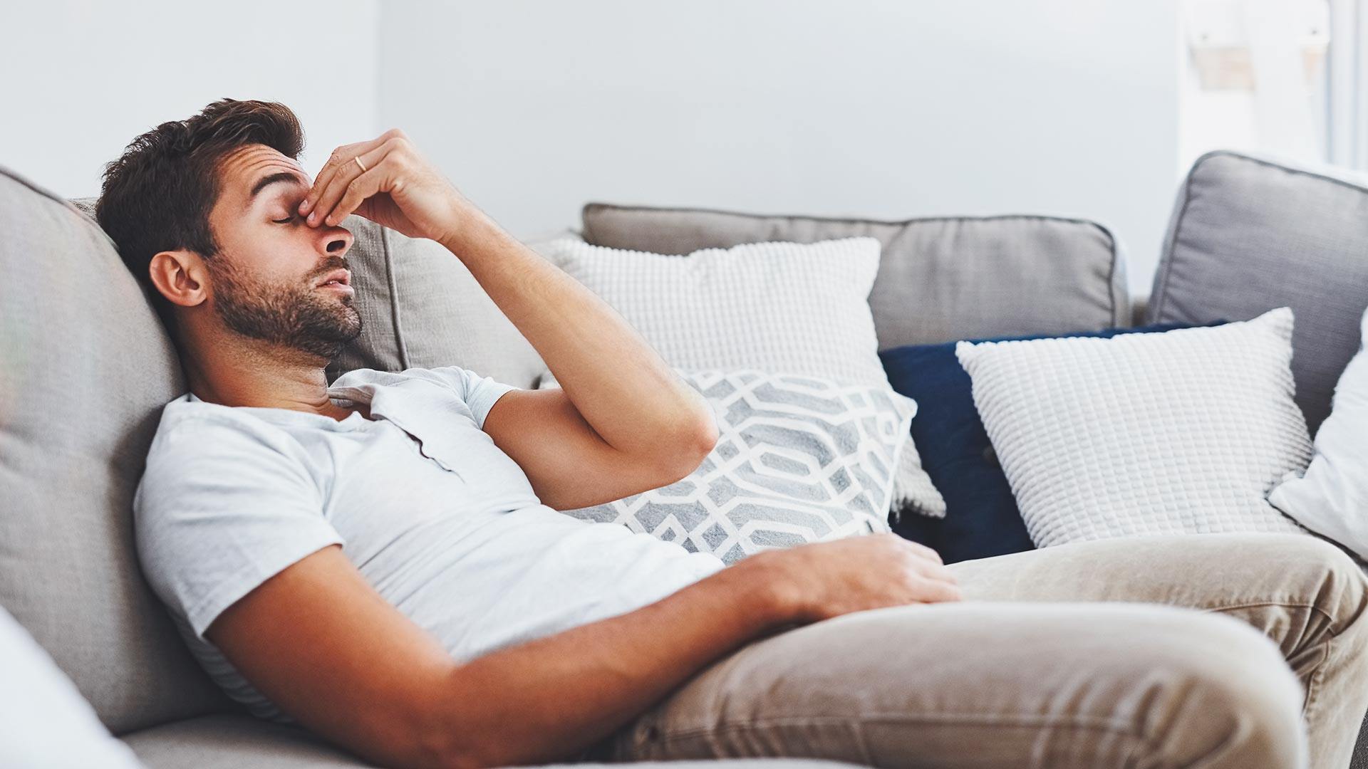 Young man feeling exhausted