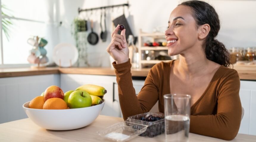 Lady looking at fruit