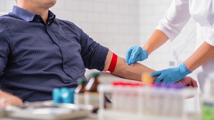 Gentleman donating blood.