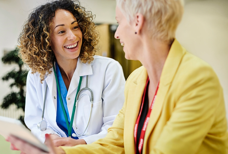 Doctor talking to lady