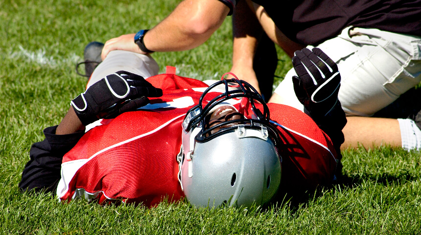 Football player laying down