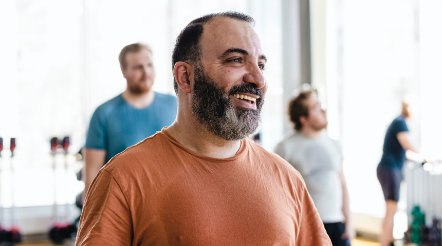 man with beard smiling