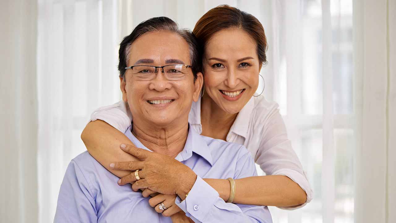 asian couple embracing