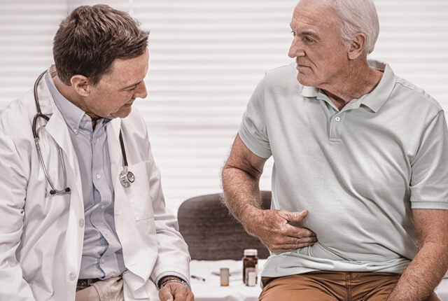 Doctor checking patient with gray hair