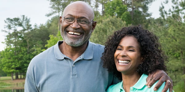 man and woman smiling