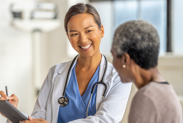 doctor speaking with patient