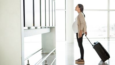 Pregnant woman in airport