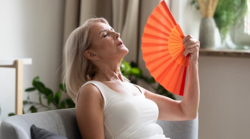 Lady fanning herself