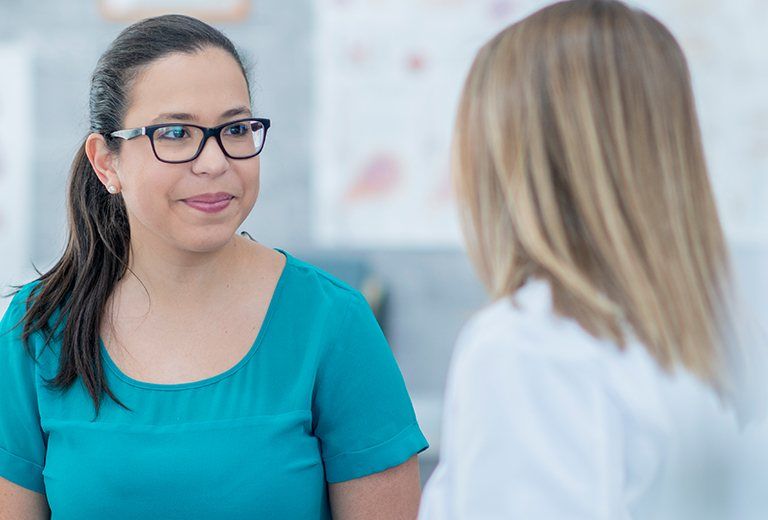 woman with doctor