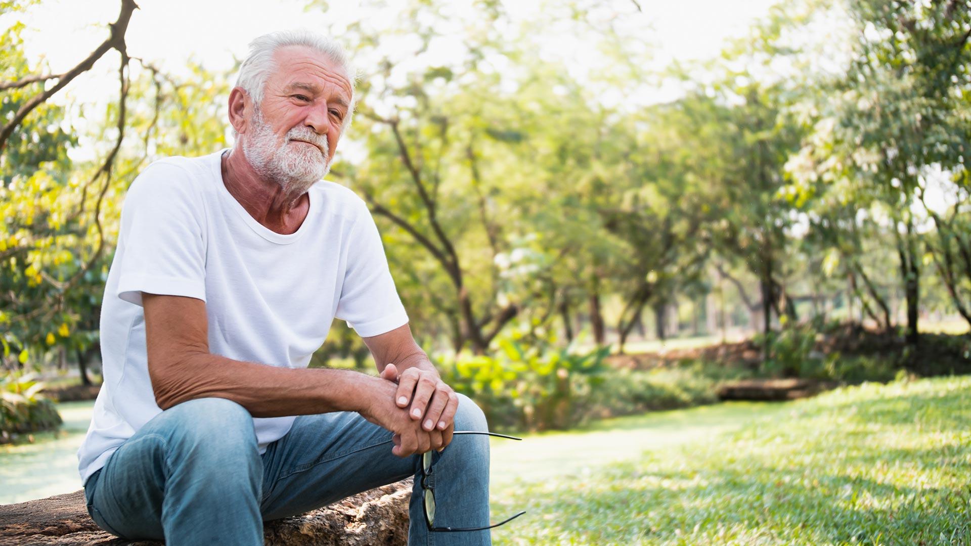 Senior man thinking at the park